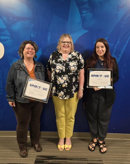 University College Dean Dr. Kelly Cichy stands with Spirit of UC awardees Jade Hunt and Deanna Donaugh