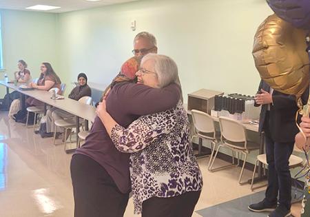Dr Jessica Leveto shares a hug with Jessie Marcinkiewicz
