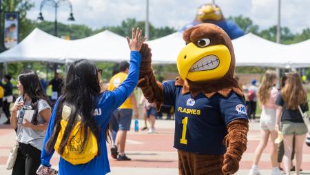 student high fiving flash