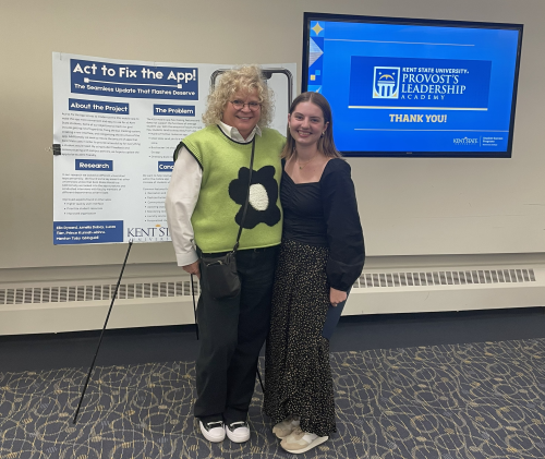 Ella poses with Provost Tankersley at a Provost Leadership Academy presentation.