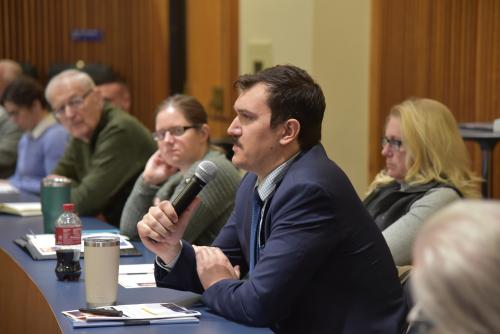 An attendee asks the panelists a question during Dronavation 2025.