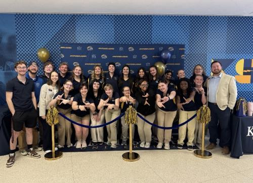 Halle in a group photo at Future Flash Day with all the 25-26 Campus Tour Guides.