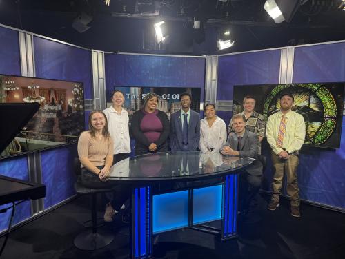 LaTaesia Snyder with students in a TV studio at the Ohio Statehouse