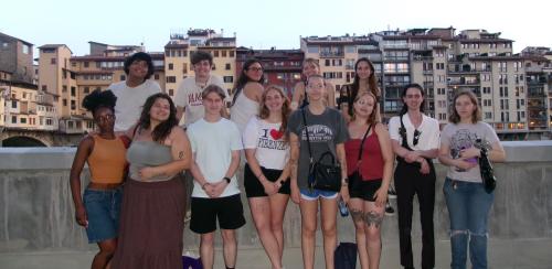 Norah (center) in a group photo with other students in Florence, Italy.