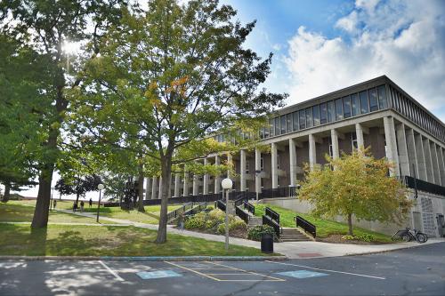 Exterior shot of Taylor Hall with trees around it