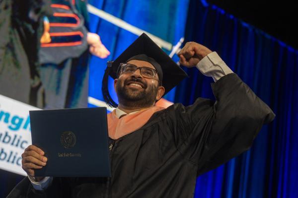 Man receiving public health degree