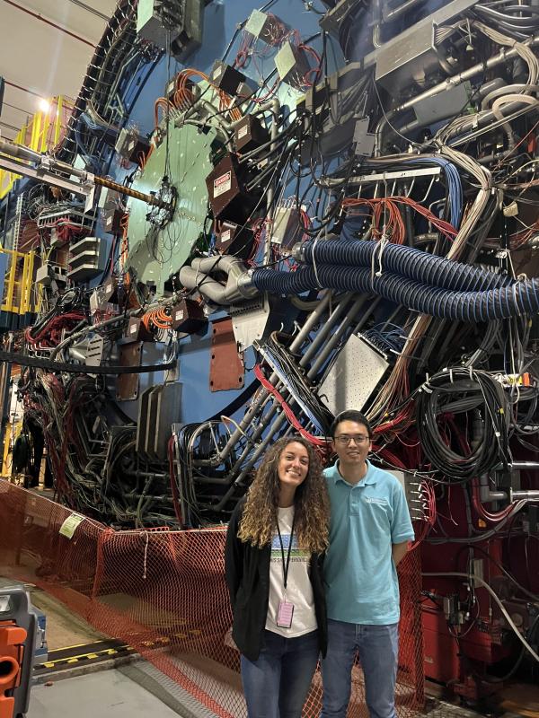 Maci at STAR KSU PhD student Maci Kesler and her Brookhaven-based SCGSR mentor Dr. Rongrong Ma stand in front of the STAR detector at Brookhaven National Laboratory (Long Island, New York).