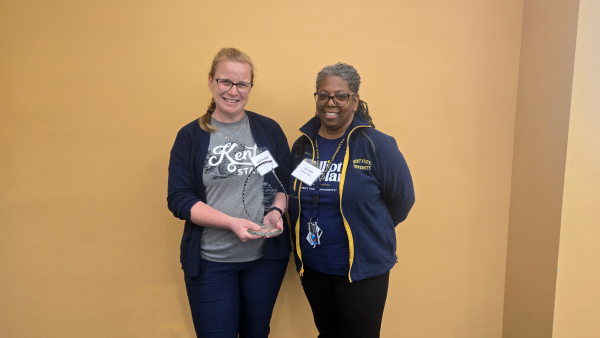 Julie Paskiet receiving her award from University College Dean, Dr. Liz Piatt.