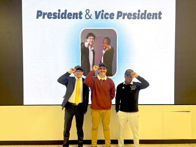 Nathan Smith is pictured with vice president Ridwan Olayiwola, a mechanical engineering major, and campaign marketing manager Braden Goloja, a business management major.