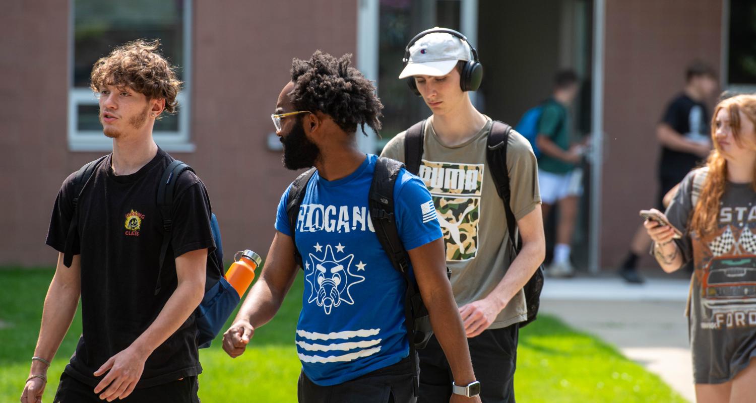Photo of students walking around the science mall