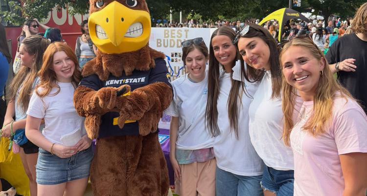 Best Buddies members take photo with Flash at blastoff