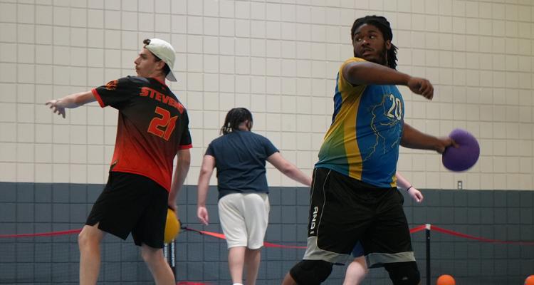 Dodgeball Vice President Carlton Pittman ready to throw a dodgeball with another group member