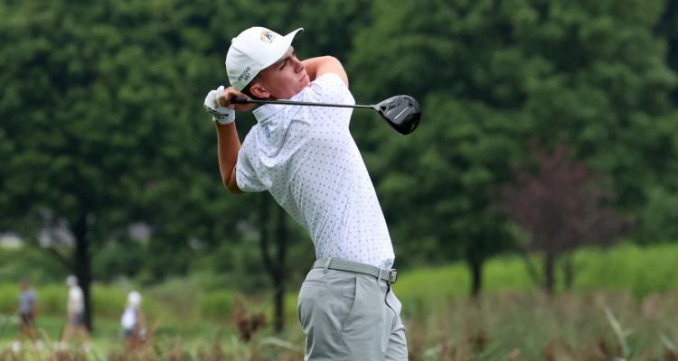 Honors College student Jordan Gilkison tees off during a golf tournament in Notre Dame.