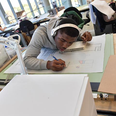 Architecture student working in studio
