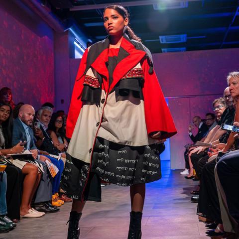 A model showcases a design by a Kent State University fashion design student during a 2023 fashion show in New York City. (Photo credit: Rami Daud, Kent State University)