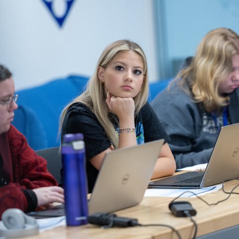 student listening in classroom