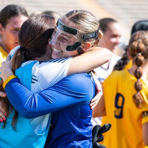 Members of the Kent State Soccer team celebrate a victory at Dix Stadium