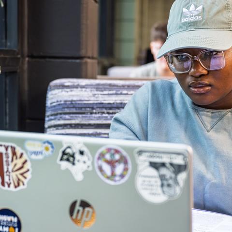 A Kent State University student works on her computer. (Photo credit: Rami Daud)