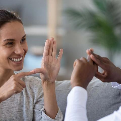 People using sign language