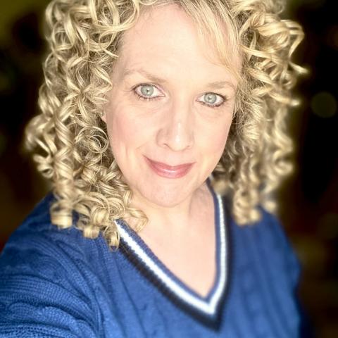 mari robertson poses for a photo