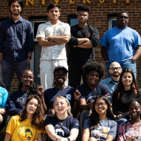 University Housing's Safety Assistants, a group of 20 individuals gathered on the steps of the MACC