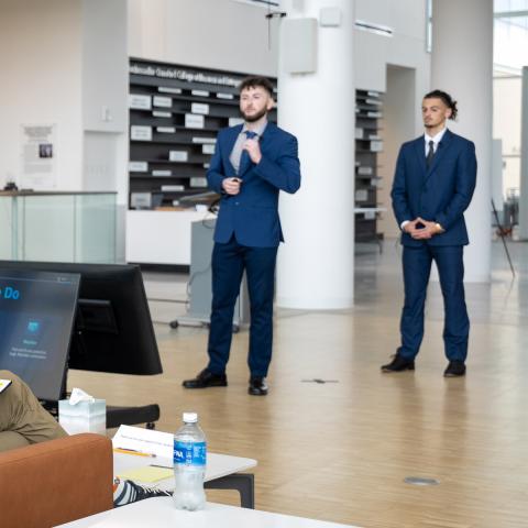 Students pitch their business to a team of entrepreneurial judges shark-tank-style. 