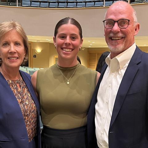 Kent State junior Sydney Davis, a marketing and finance major, is pictured with Kent State business alums Angelo and Joyce Kinicki.