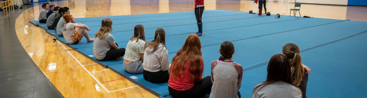 Matthew Kane speaking to his class before their final exam