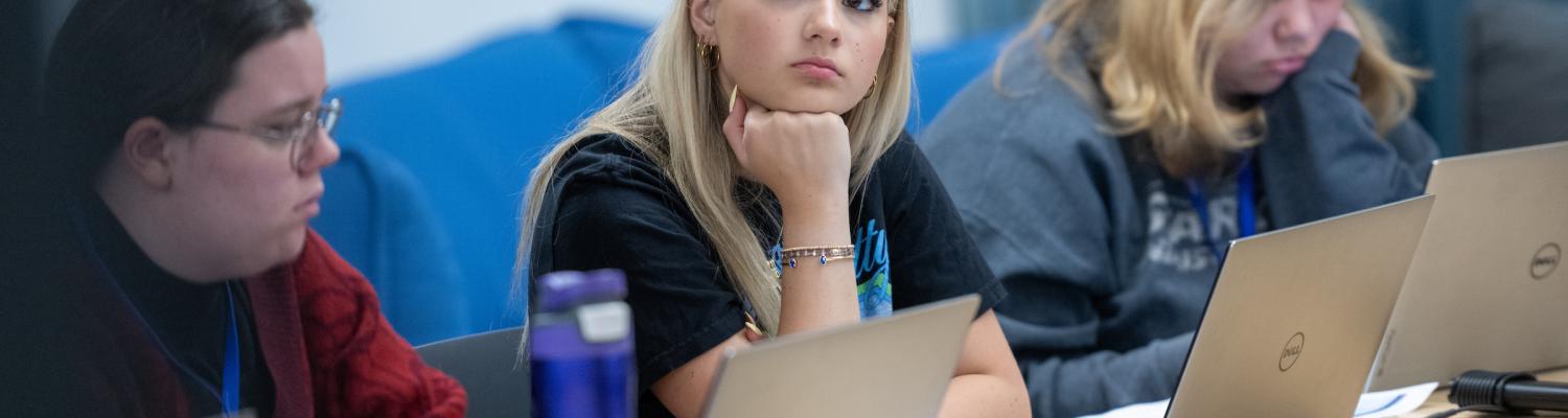 student listening in classroom