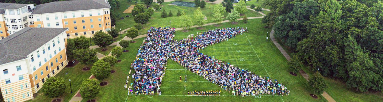 Freshman Class gathered on Manchester Field in the shape of a K to mark the start of their College Career directly following University Convocation