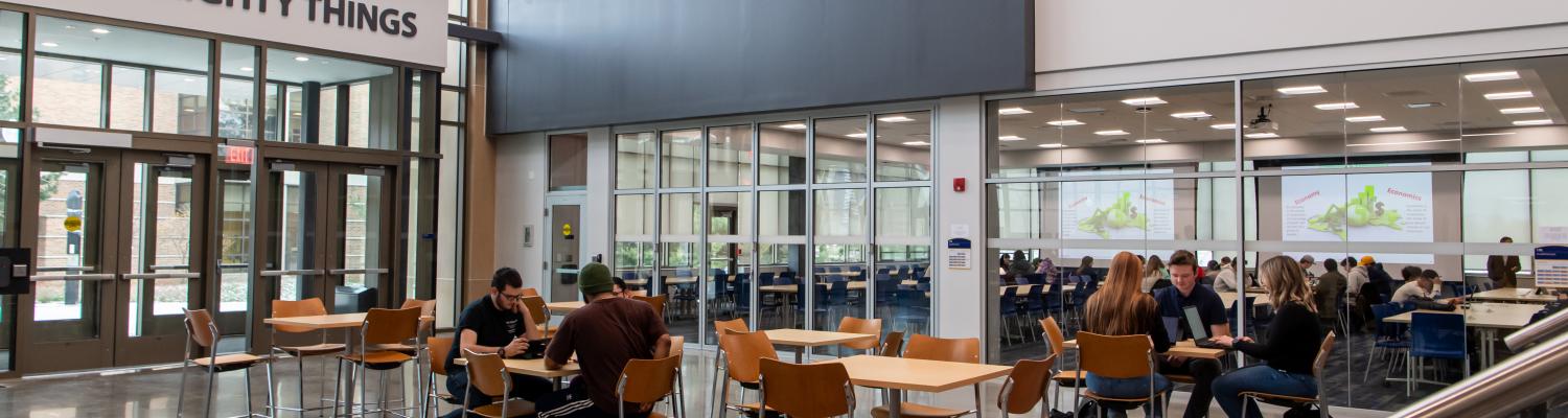 Atrium of the Aeronautics and Engineering building featuring the slogan "Dare Mighty Things"