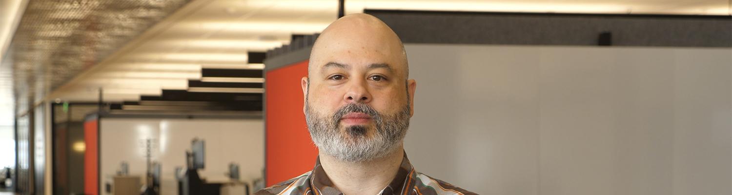 Andy Vitale Headshot in office