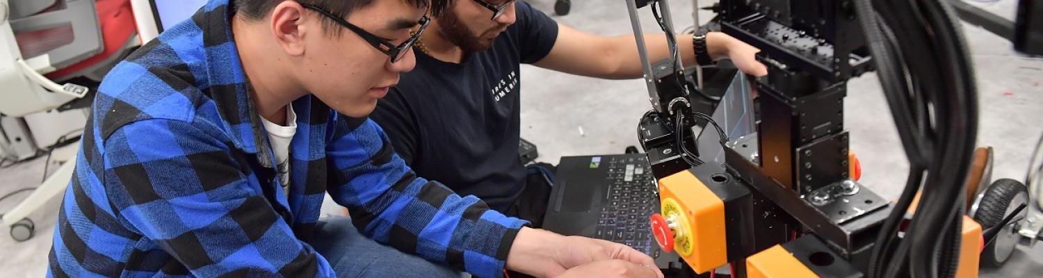 students working on robotics