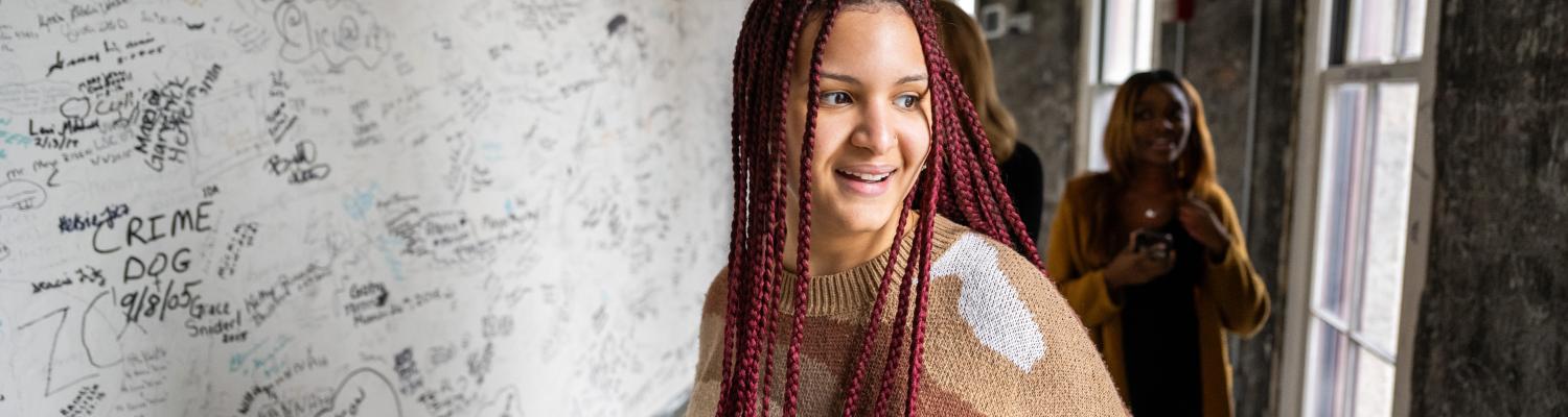 Female with long red braids
