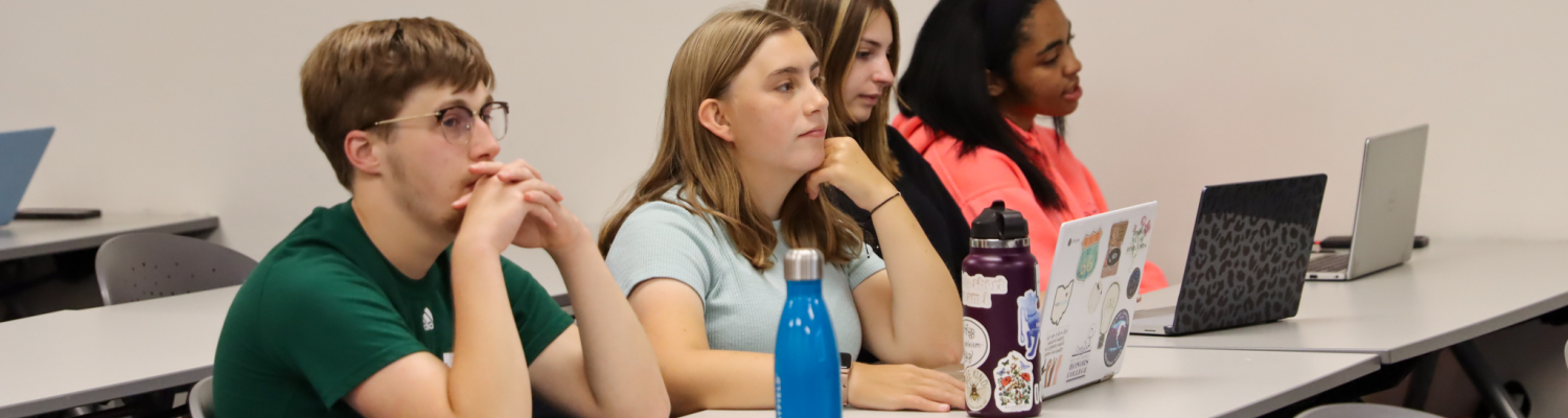 Students in a Career and Community Studies Health and Wellness course listening to the instructor.