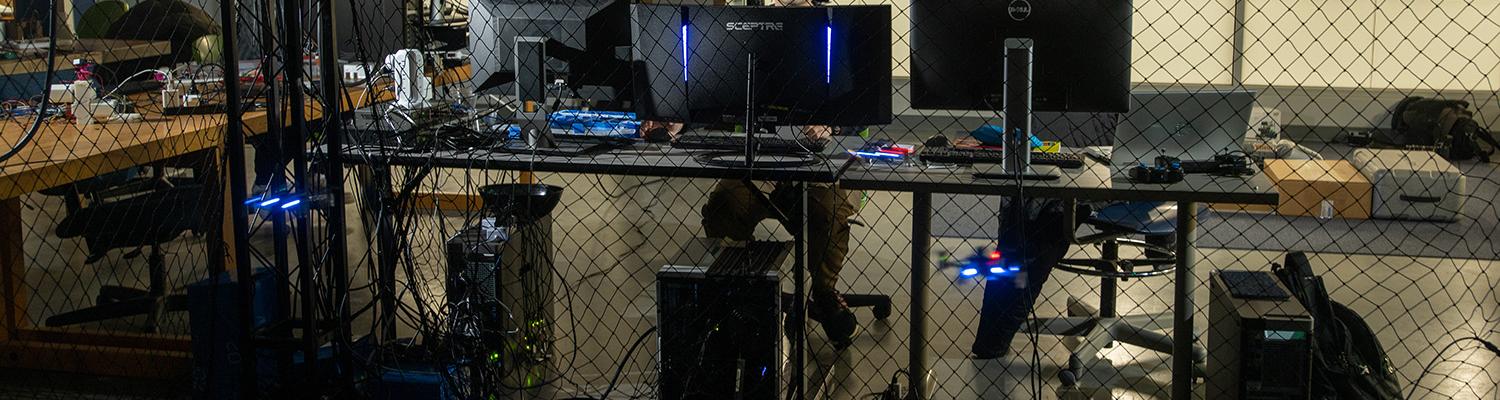Student observes a drone swarm