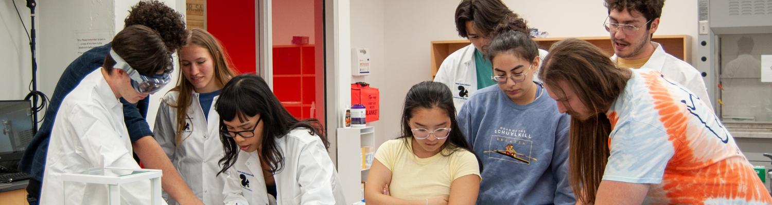 Students in the REU program complete a lab safety escape room exercise.