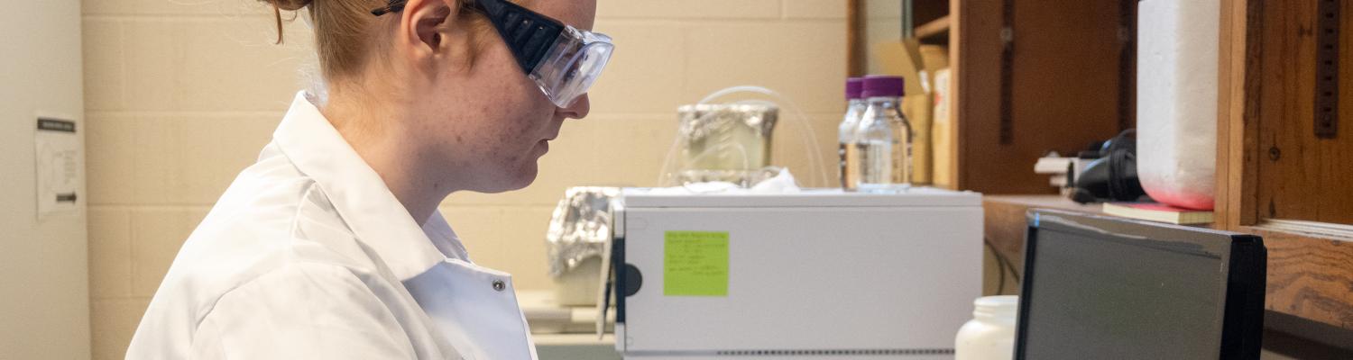 An undergraduate student works in a research laboratory in Chemistry.