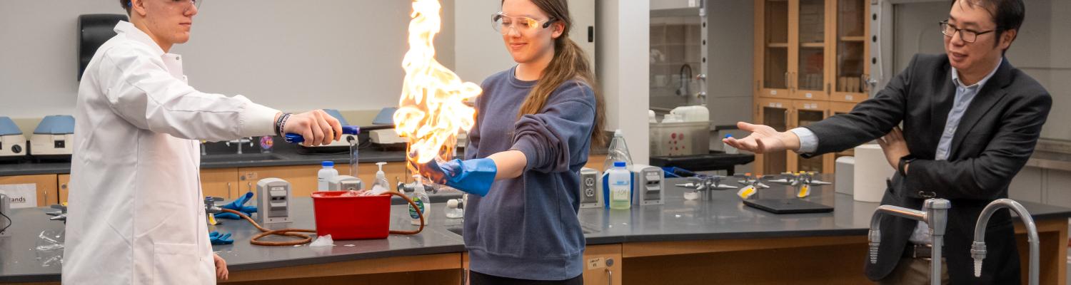 Students participate in a demonstration with a faculty member.