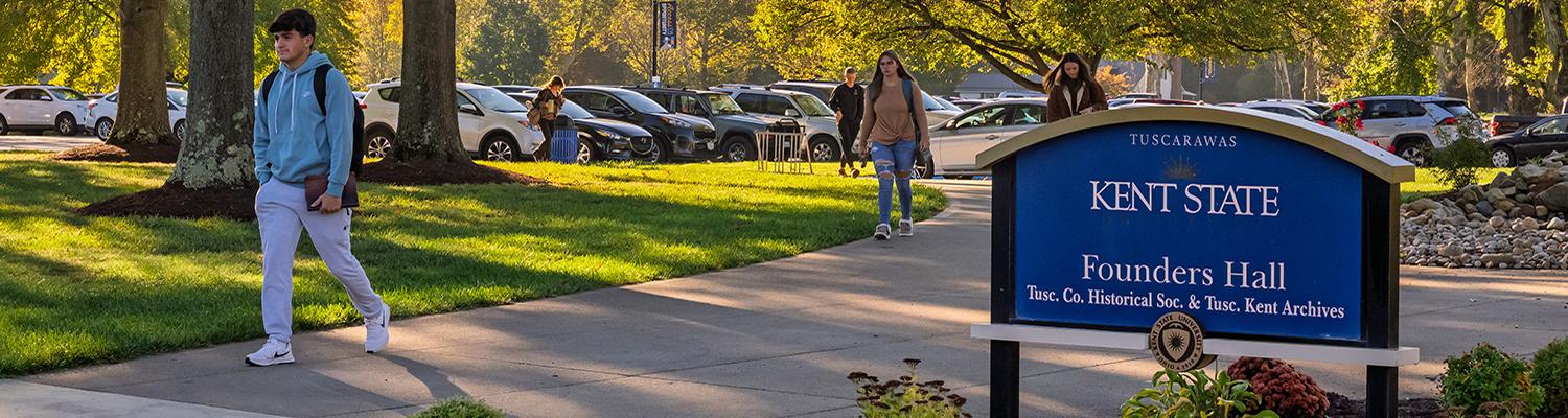 Students walking towards Founders Hall