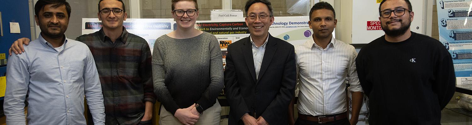 Yanhai Du and graduate students in the fuel cell lab