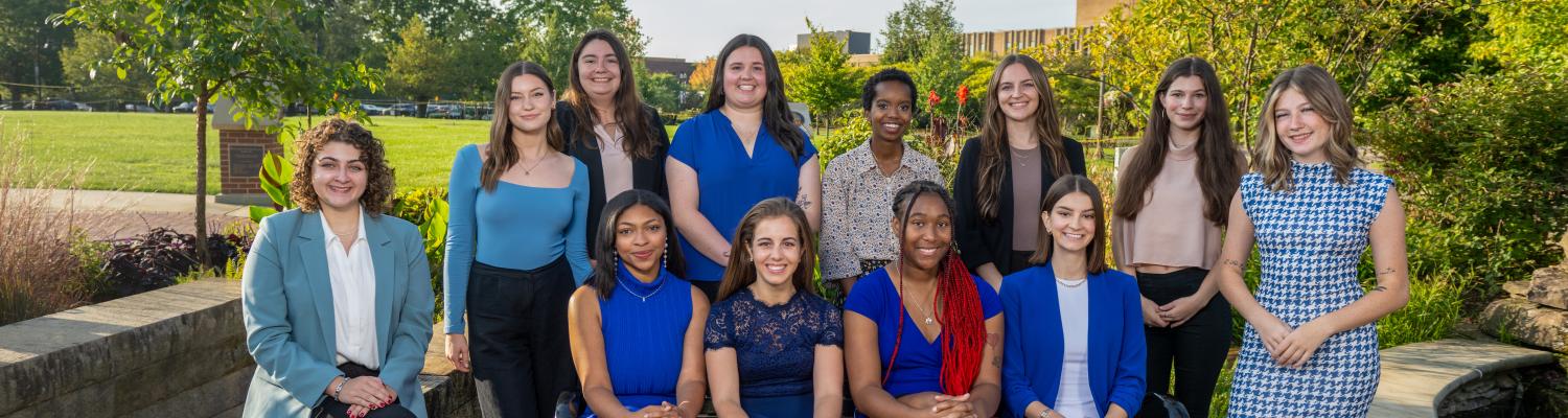 Photo of Homecoming Court students smiling and looking at the camera.