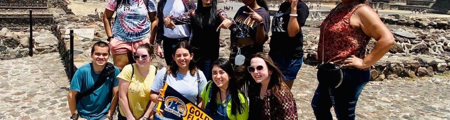 Group of Kent State University students pose for a group photo while studying abroad.