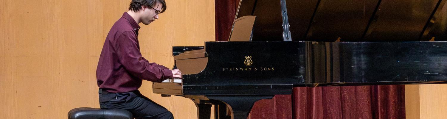 man playing piano