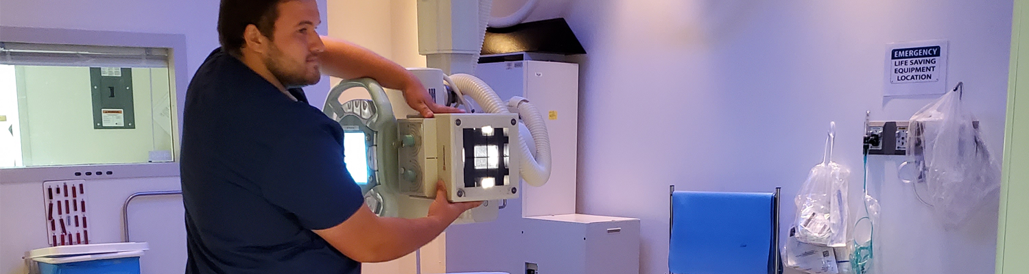 Rad Tech Student Aligning Machine