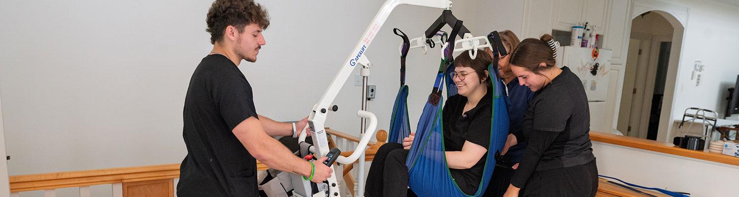 Students practicing their OTA skills at the Locke House of 51�Թ��� at East Liverpool.