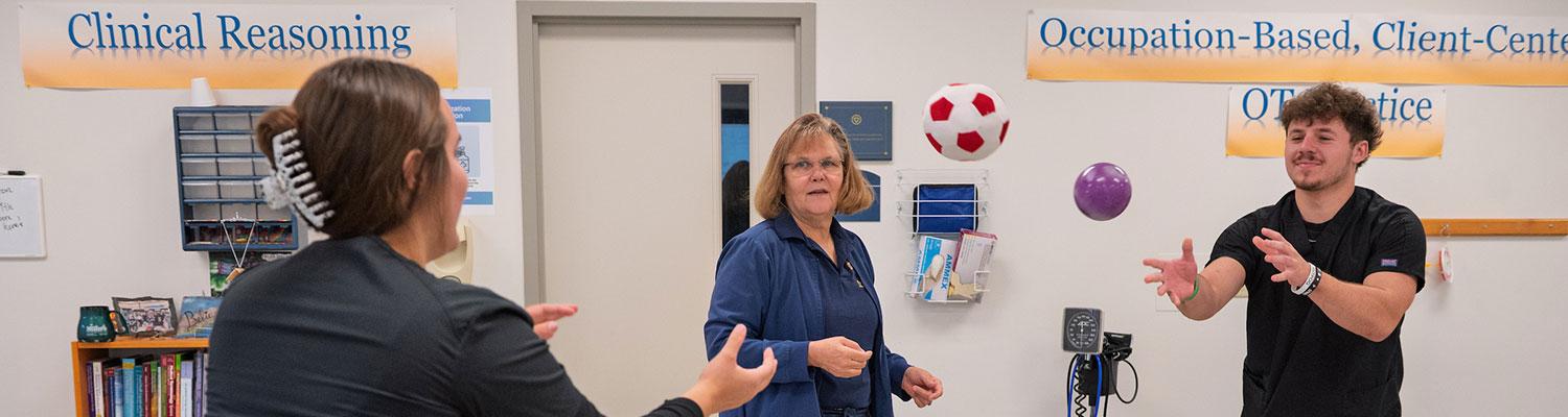 Kathy Swoboda and her students in the Occupational Therapy Assistant program gaining hands-on experience