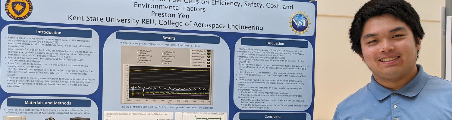 Engineering student Preston Yen stands next to a poster describing his project, "The Optimal Fuel: Evaluating Fuels for Fuel Cells on Efficiency, Safety, Cost, and Environmental Factors."