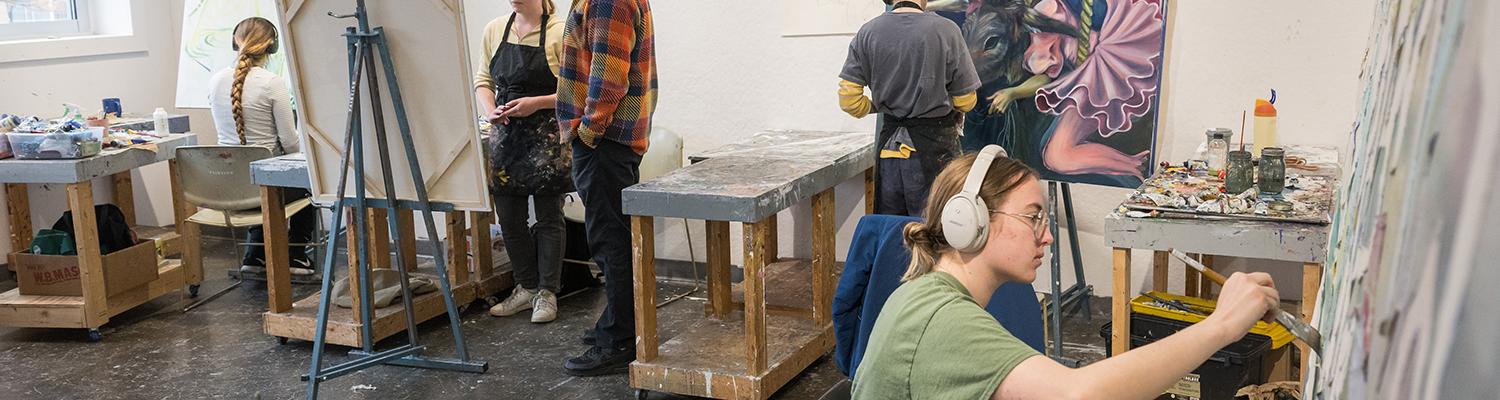 Student painting in painting studio