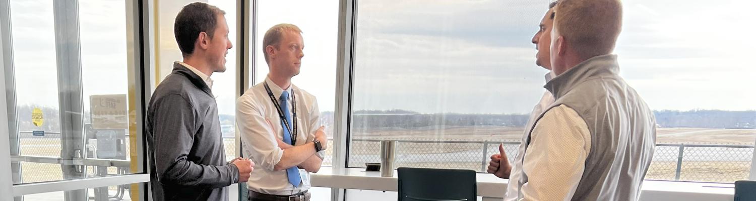Assistant Dean Brian Neff meets with industry partners
